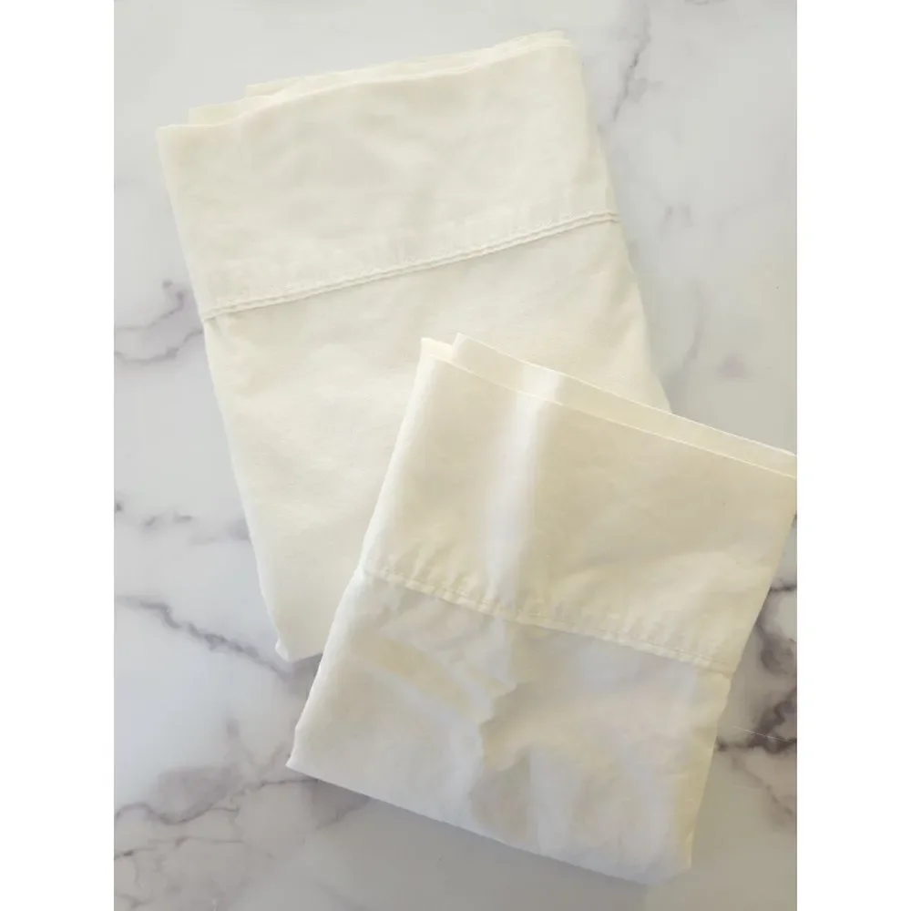 JcPenny home twin flat sheet cream and 1 swiss dot textured pillowcase sham